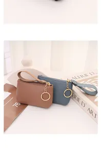 Mini coin purse with wrist strap and key ring, litchi pattern PU leather clutch bag for daily use.
