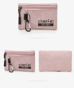 Portable oxford cloth coin purse with zipper closure, card holder and keychain for use.