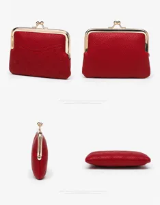 Red leather kiss-lock coin purse retro clutch wallet with gold metal frame and floral pattern.