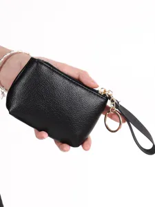Black litchi pattern leather coin purse with wrist strap and keychain, mini zipper pouch main
