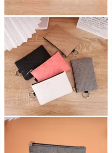 Waterproof coin purse key pouch card holder with cute embossed pattern and metal keychain.
