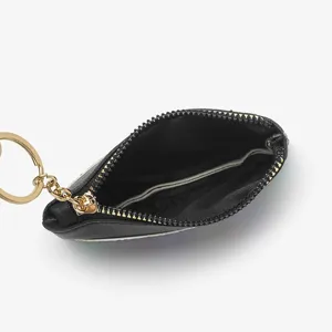Classic black leather coin purse with zipper closure and gold-tone key ring, top open view.