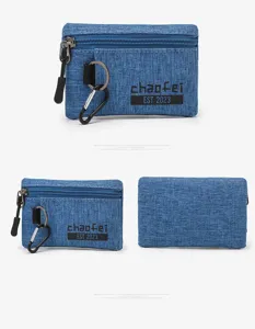 Blue denim coin purse with zipper keychain and carabiner clip portable card wallet for daily use.