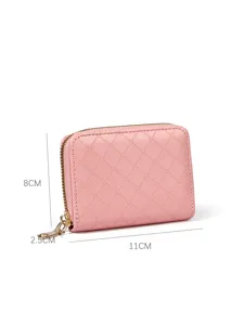 Pink quilted zip wallet coin purse compact mini card holder with gold hardware and dimensions.