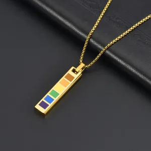 Macro view of rainbow square pendant on gold titanium steel box chain necklace