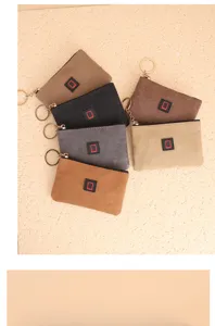 Monedero de lona con llavero y cierre de cremallera, tarjetero y cartera portátil elegante.