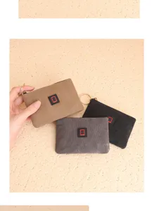 Pequeño monedero de lona compacto con llavero, bolso portátil ideal para tarjetas.