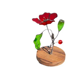 Artistic red stained glass poppy flower sculpture with rustic wooden base for home