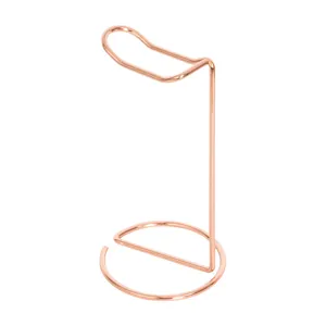 Minimalist rose gold metal headphone stand featuring a sleek iron art display design