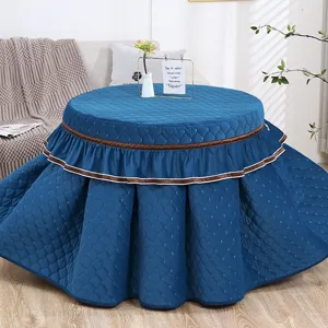 Verdikte gewatteerde ronde tafelhoes, warme blauwe verwarmingstafelrok met stijlvolle volants.