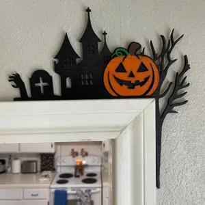 Detailed view of a wooden Halloween door corner decoration featuring a pumpkin and castle.