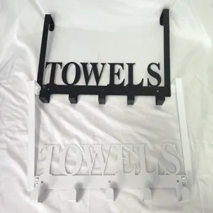 Black and white iron over-the-door towel racks with 5 hooks and cutout design