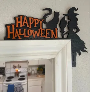 Detailed close-up of a black wooden Halloween door corner decoration featuring a witch and cat