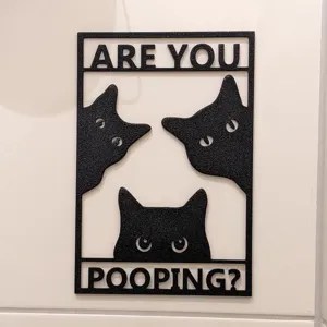 Humorous black metal cat bathroom sign featuring peeking cats with Are You Pooping text