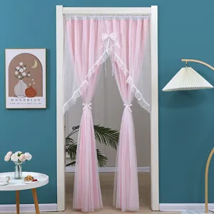 Detailed view of the pink layered lace door curtain, featuring delicate bows and sheer mesh.