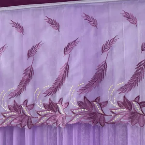 Purple sheer curtain detail, delicate feather embroidery lace fabric, elegant room divider.