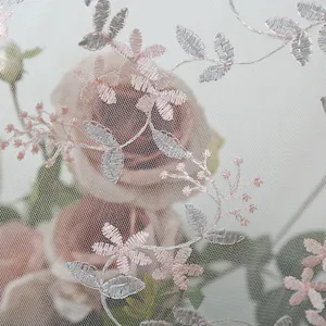 Exquisite floral embroidery lace sheer curtain fabric detail featuring pink and silver threads.