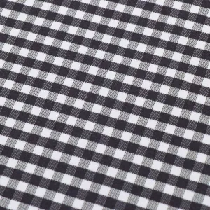 Close-up detail of black and white gingham fabric, showing clear weave texture swatch.