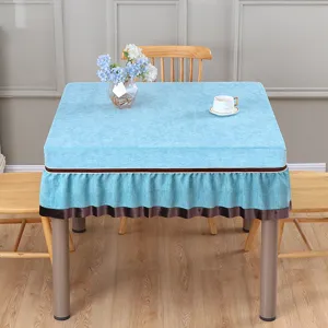 Detail view of the elegant blue square mahjong table cover with stylish brown ruffled trim.