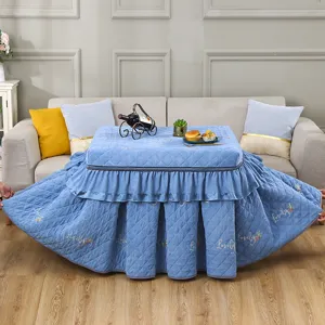 Thickened square heating table cover detail showing quilted blue fabric and cozy design.