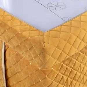 Thickened winter heating table cover detail view, soft yellow quilted fabric, durable design.