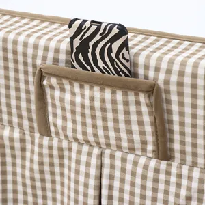 Detailed view of brown checkered velvet table cover featuring a convenient storage pocket design.
