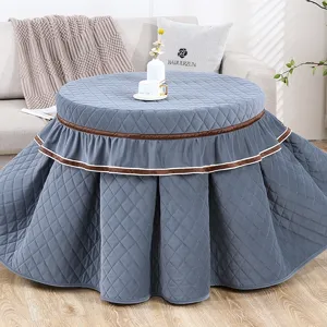 Dik gewatteerd rond tafelkleed met elegante volants, gezellige huisdecoratie tafelrok.