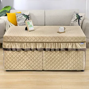 Detailed view of the thickened quilted heating table cover with ruffles for winter.