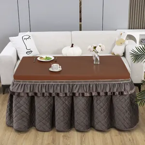 Cozy winter heating table cover detail, waterproof surface and thick quilted fleece skirt.