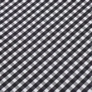 Black and white checkered table cloth fabric detail, soft four-season fleece material texture.