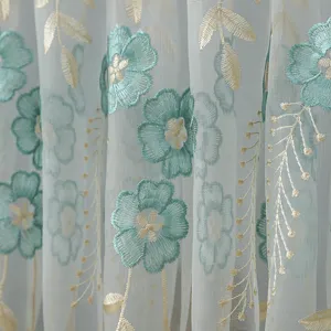 Korean style lace sheer curtain detail showing embroidered blue flowers and gold leaves for home decor.