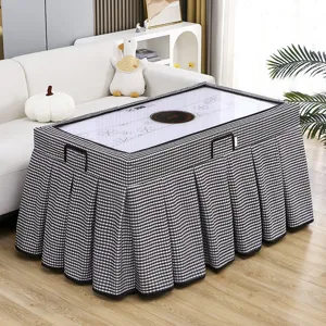 Black and white plaid table cover for heating table or mahjong machine with pleated skirt.