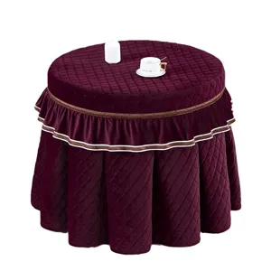 Verdikte fluwelen ronde verwarmingstafelhoes met gewatteerd ontwerp en elegante rok.