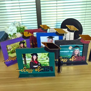 Collection of decorative wooden 2024 graduation photo frames with tassel and cap