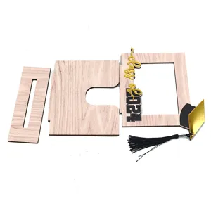 Detailed view of the components for a wooden graduation frame with Class of 2024 decor.