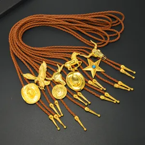 Detailed collection of vintage western cowboy bolo ties with gold metal pendants