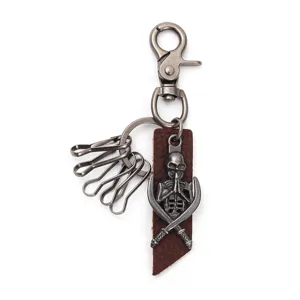 Vintage alloy skull keychain with leather pendant and metal snap hook for men.