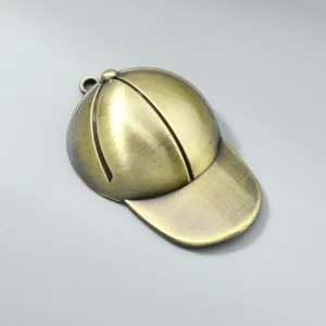 Detailed macro view of antique bronze baseball cap pendant for DIY jewelry and crafts