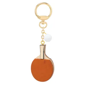 Retro-Tischtennisschläger-Schlüsselanhänger aus Leder mit weißem Ball für Taschen-Dekoration