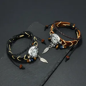 Macro view of bohemian retro cowhide leather bracelet watches with feather charms