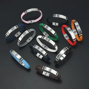 Various colors of braided leather bracelets featuring polished stainless steel engraving plates