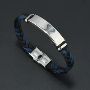 Detailed view of men's braided leather bracelet featuring a polished steel plate