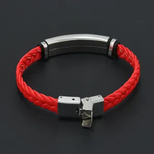 Close-up view of a vibrant red braided leather bracelet with stainless steel plate
