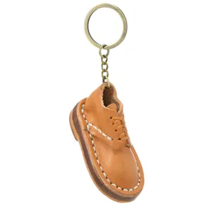 Porte-clés Vintage en Cuir Fait à la Main Mini Chaussure Pendentif Créatif en Cuir de Vachette Anneau de Clé Retro en Métal