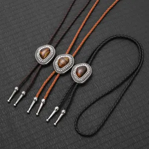 Vintage Western Cowboy Bolo Ties Set mit geflochtenen Lederkordeln und braunen Tigerauge-Steinen