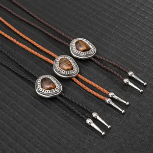 Vintage Western Cowboy Bolo-Krawatten mit geflochtenen Lederkordeln und Tigerauge-Steinen