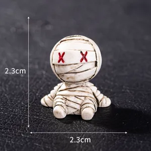 Cute Halloween mummy desktop ornament, mini resin figure for office desk and car decor.