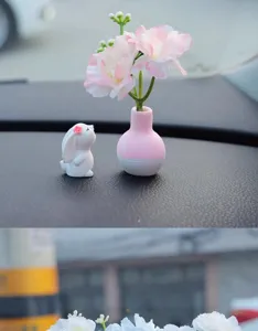 Cute resin rabbit figurine and pink vase flower car dashboard ornament for auto interior decor