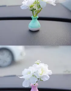Mini car simulation flower vase ornament, creative micro landscape decor for dashboard interior.