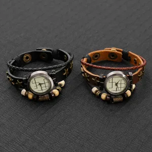 Close-up of vintage multi-layer leather bracelet watches with star studs and bead details